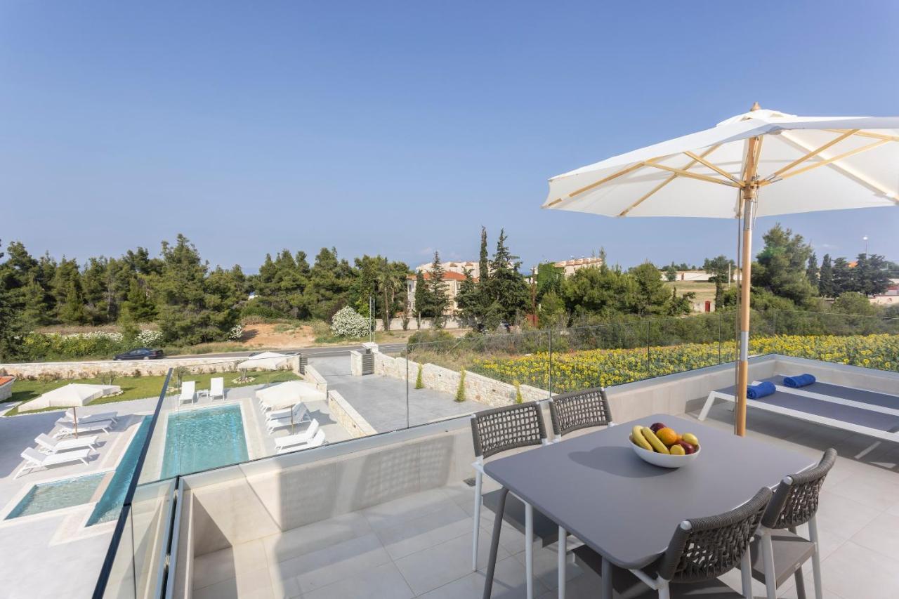 Anna Mare Luxury Apartments Afytos Bagian luar foto